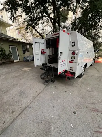 Magnet Plumbing service vehicle on-site for Water Heater Repair in The Courts of Four Seasons