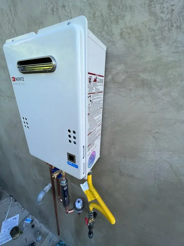 Tankless water heater installation for The Courts of Four Seasons homes